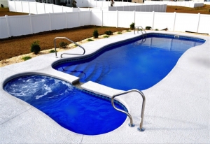 5 Design Tips for Installing Water Features in Fiberglass Inground Pools